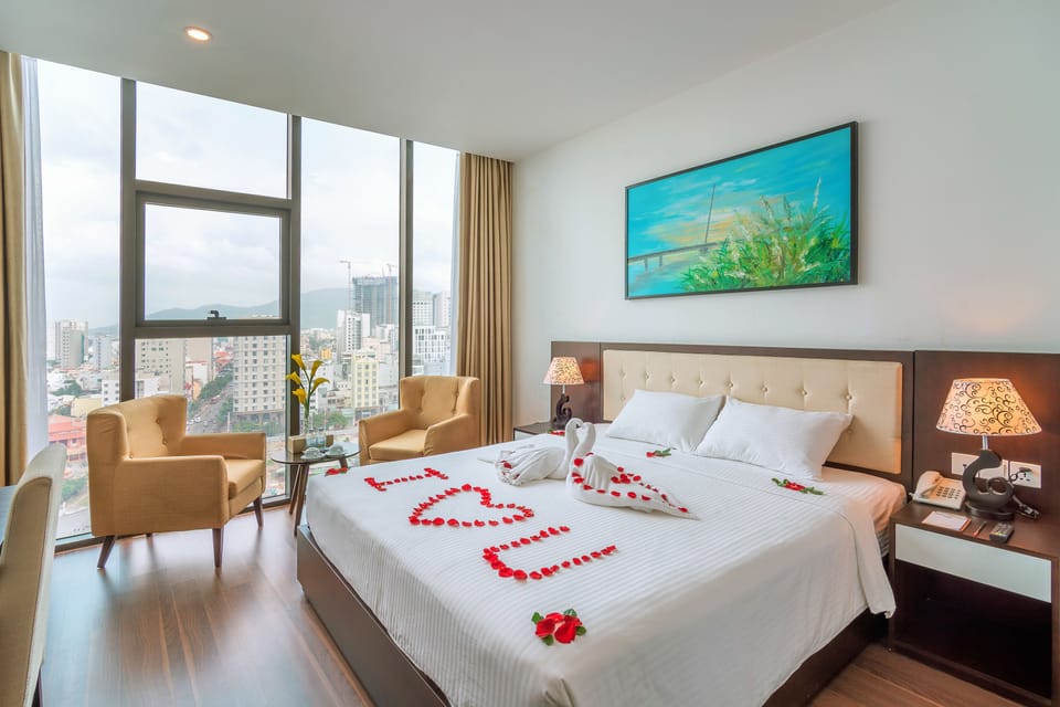 Deluxe Double Room, 1 King Bed, Beach View | Minibar, in-room safe, desk, blackout drapes