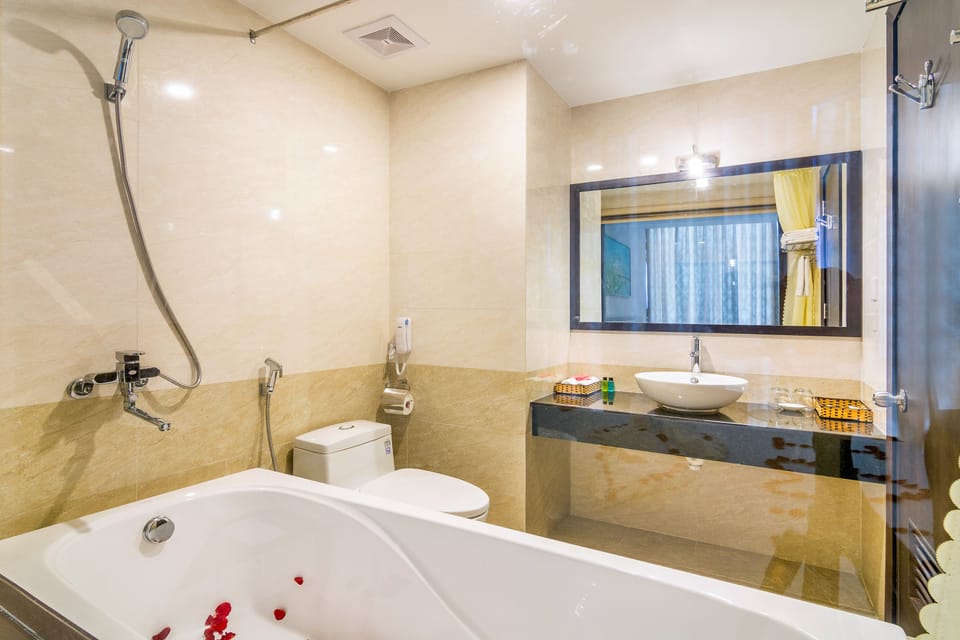 Deluxe Double Room, 1 King Bed, Beach View | Bathroom | Free toiletries, hair dryer, slippers, bidet