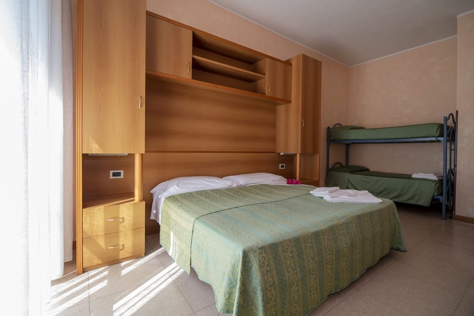 Quadruple Room | In-room safe, desk, laptop workspace, cribs (surcharge)