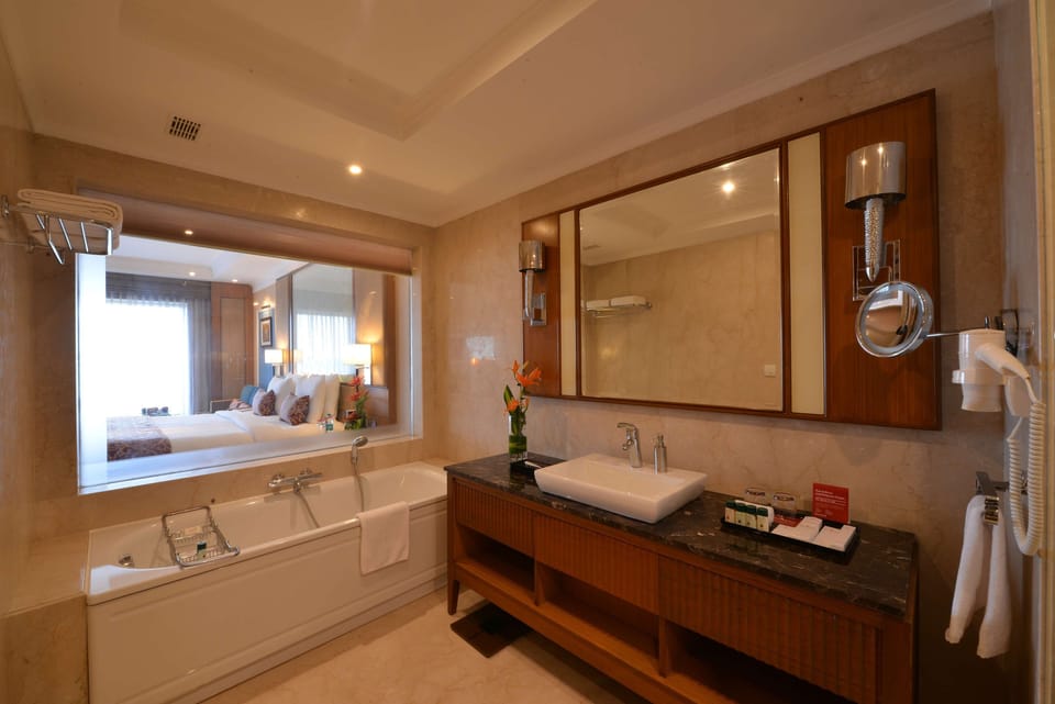 Egyptian cotton sheets, premium bedding, minibar, in-room safe
