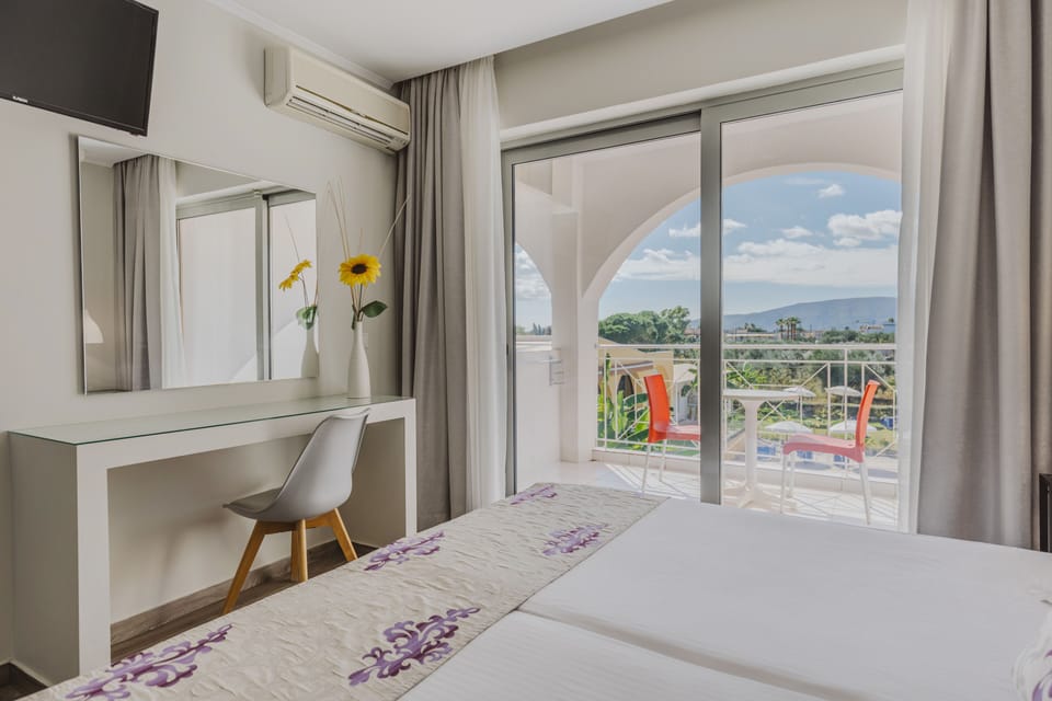Deluxe Twin Room, 2 Twin Beds, Balcony | Down comforters, in-room safe, blackout drapes, iron/ironing board