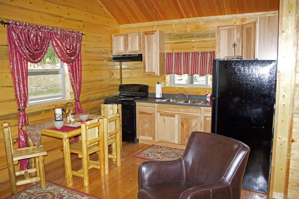 Dining table and kitchen.