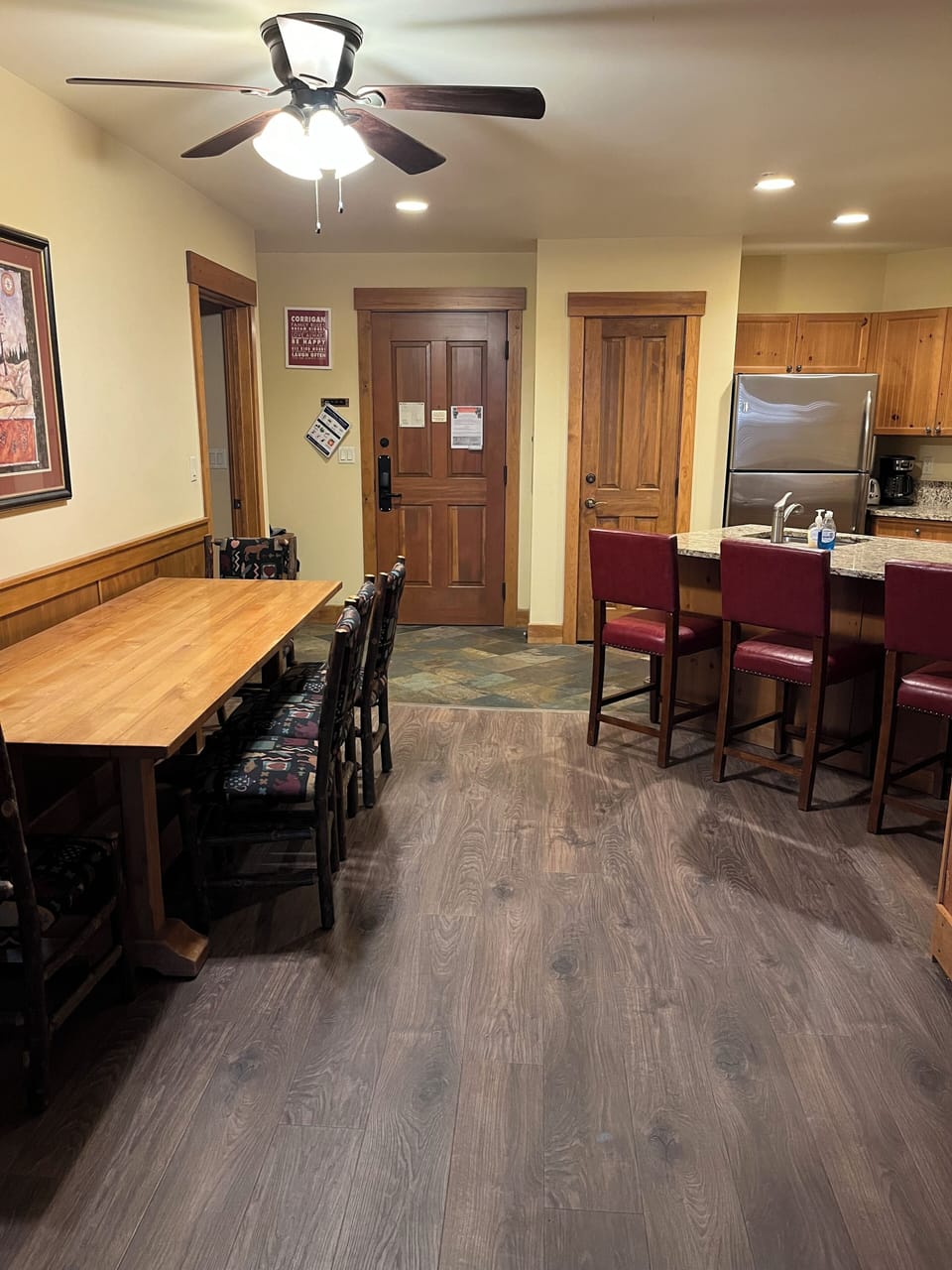 Dining table comfortably seats eight (some chairs not shown) plus counter chairs