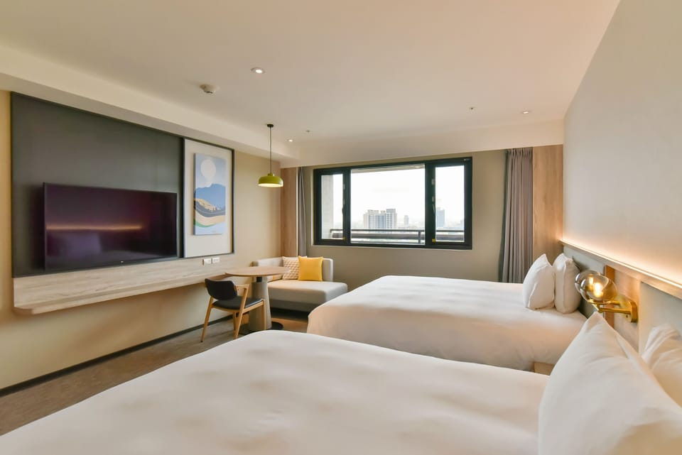 Premium bedding, down comforters, free minibar, in-room safe