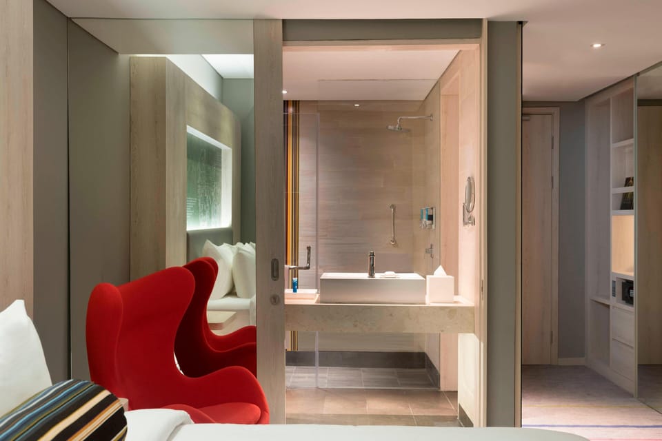 Room, 1 King Bed | Bathroom | Shower, rainfall showerhead, designer toiletries, hair dryer