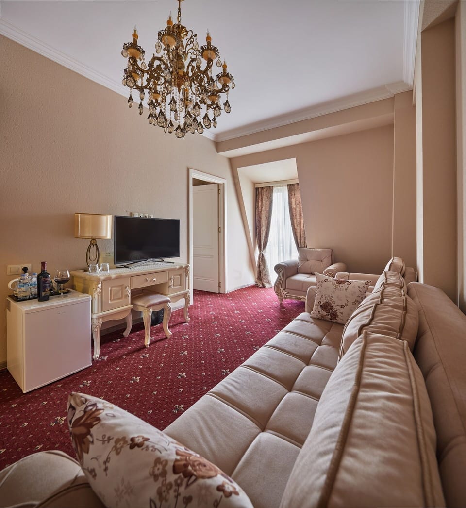 Luxury Room | Living area | Plasma TV
