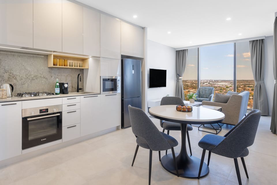1 Bedroom Suite | Private kitchen | Fridge, microwave, stovetop, dishwasher