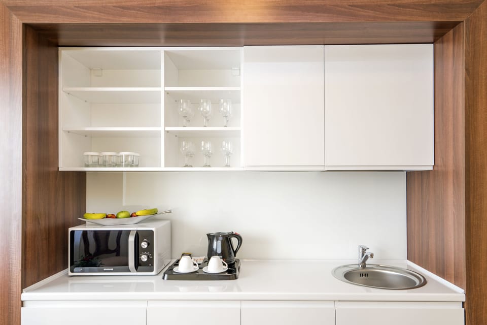 Presidential Suite, 1 Bedroom, Kitchen | Private kitchenette | Coffee/tea maker, fridge, microwave
