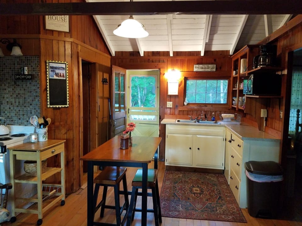 Bath on the left and 2 bedrooms on the right.