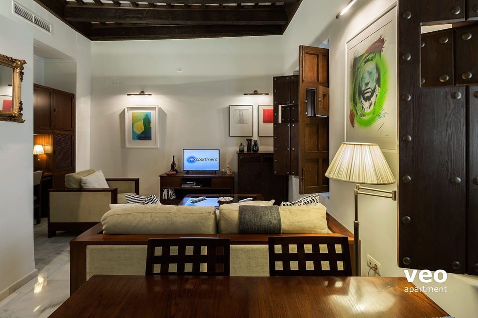 The living space has 2 windows overlooking Fabié street.