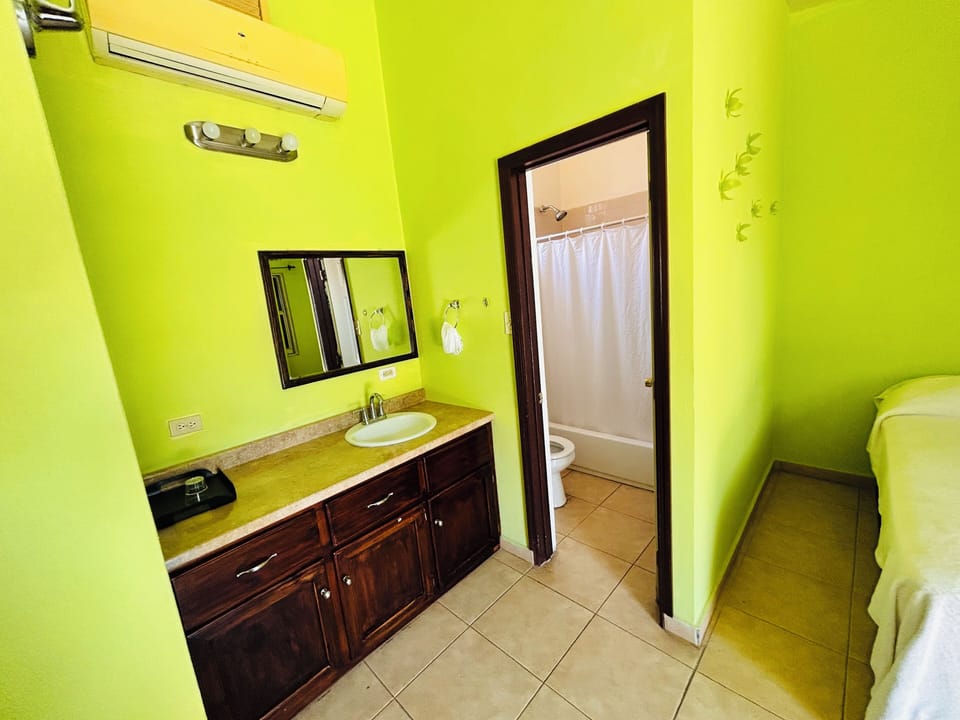 Superior Room, 1 King Bed | Bathroom | Deep soaking tub, free toiletries, towels
