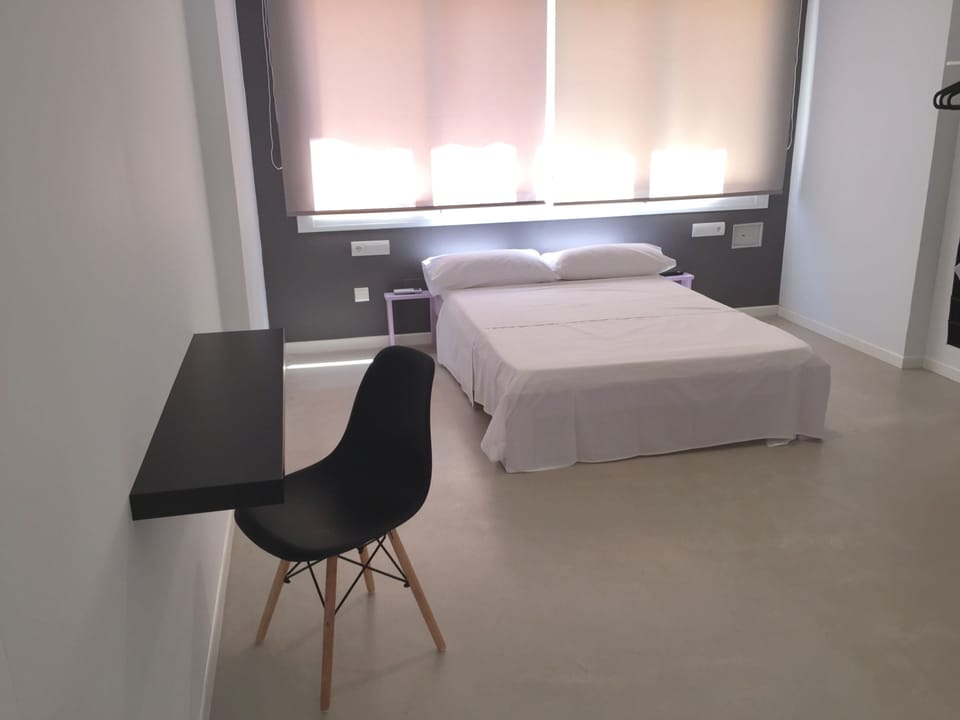 Double Room | Down comforters, desk, laptop workspace, blackout drapes