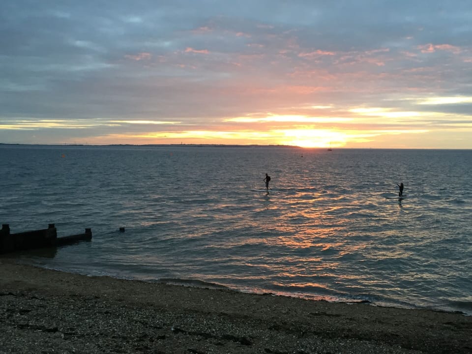 Paddle boarding off Whitstable Beach