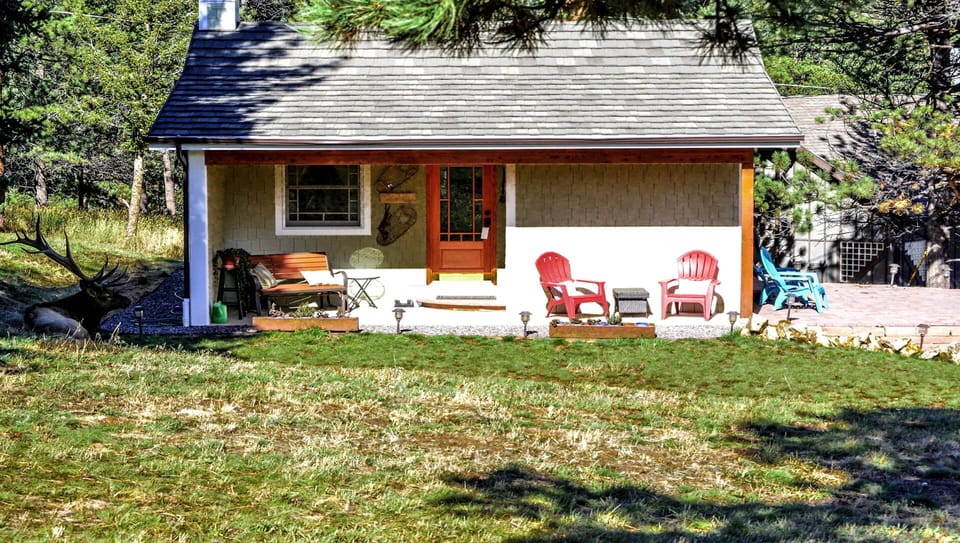 Cabin outside with elk (left of Cabin)