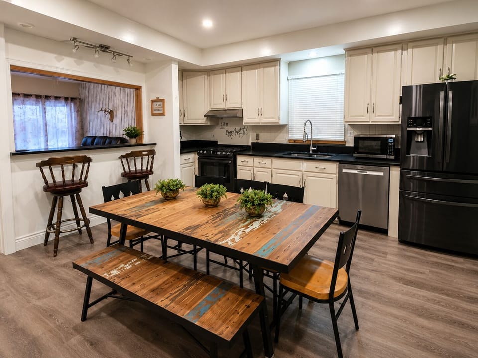 Fully equipped kitchen with spacious dining area and breakfast bar.