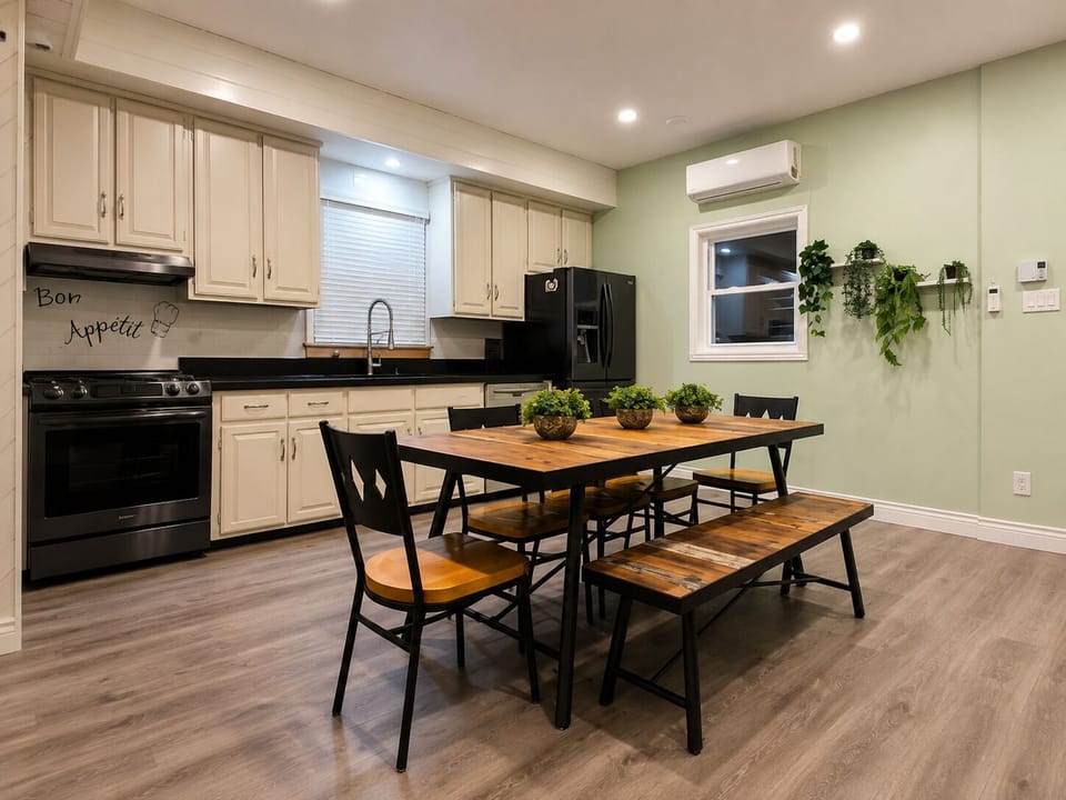 Bright, fully equipped kitchen and dining area with air conditioning.