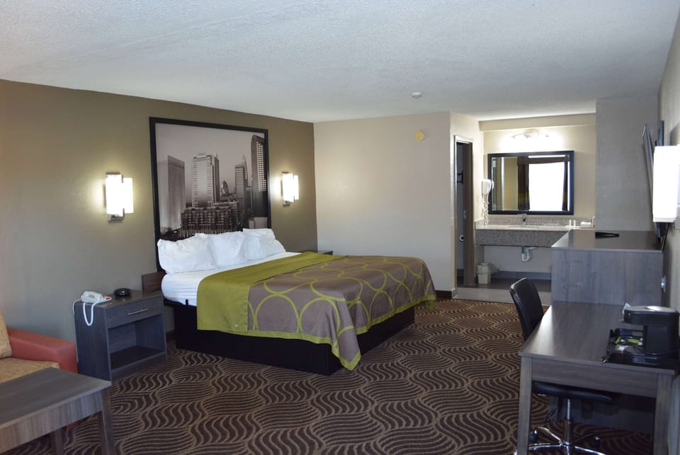 Room, 1 King Bed, Non Smoking | Desk, iron/ironing board, free cribs/infant beds, rollaway beds