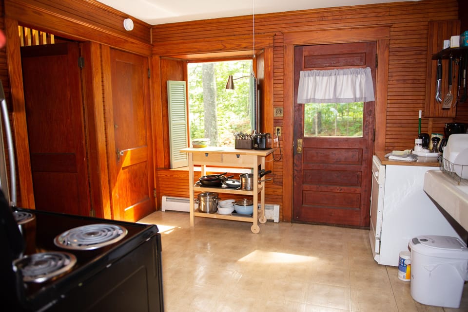 Kitchen, with door to outside