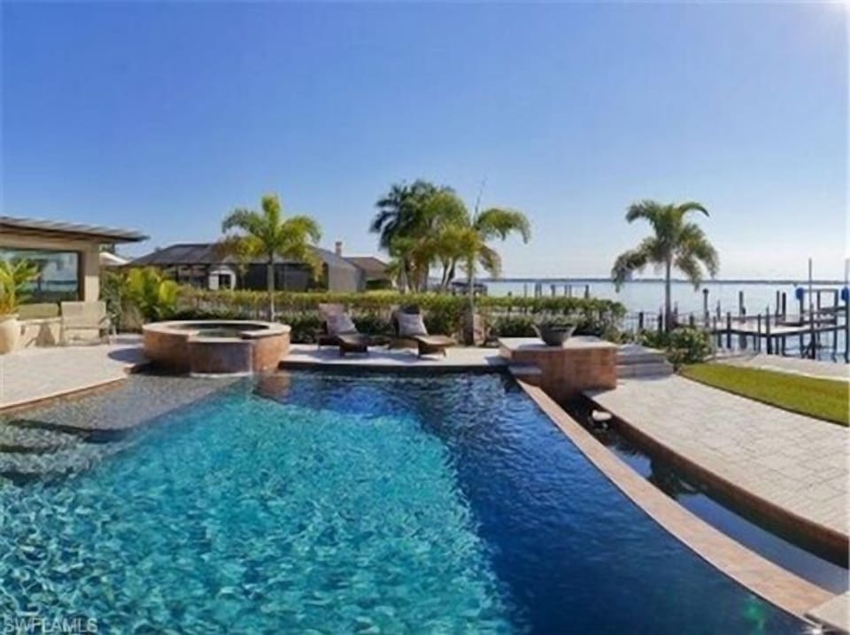 Hot tub cascading into infinity pool.