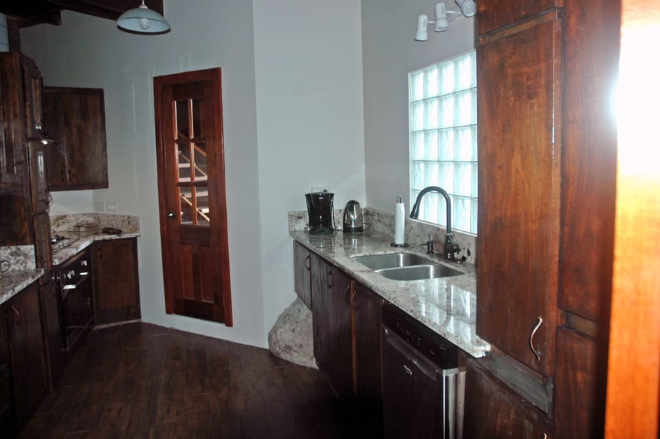 Renovated kitchen with 5 burner stove, refrigerator and dishwasher