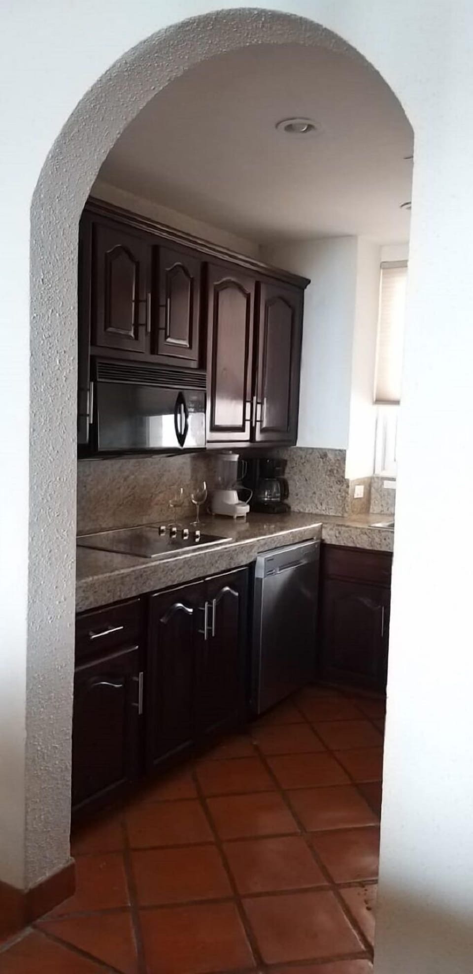 Kitchen Through Archway, refrigerator, sink and oven not pictured