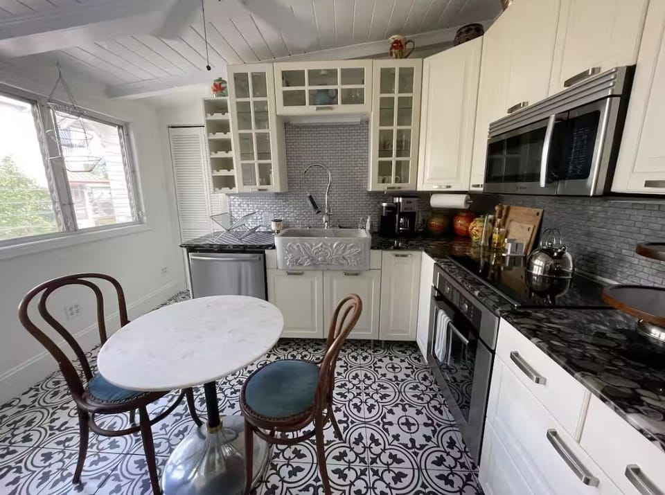 Fully stocked kitchen stainless appliances, access to fenced backyard