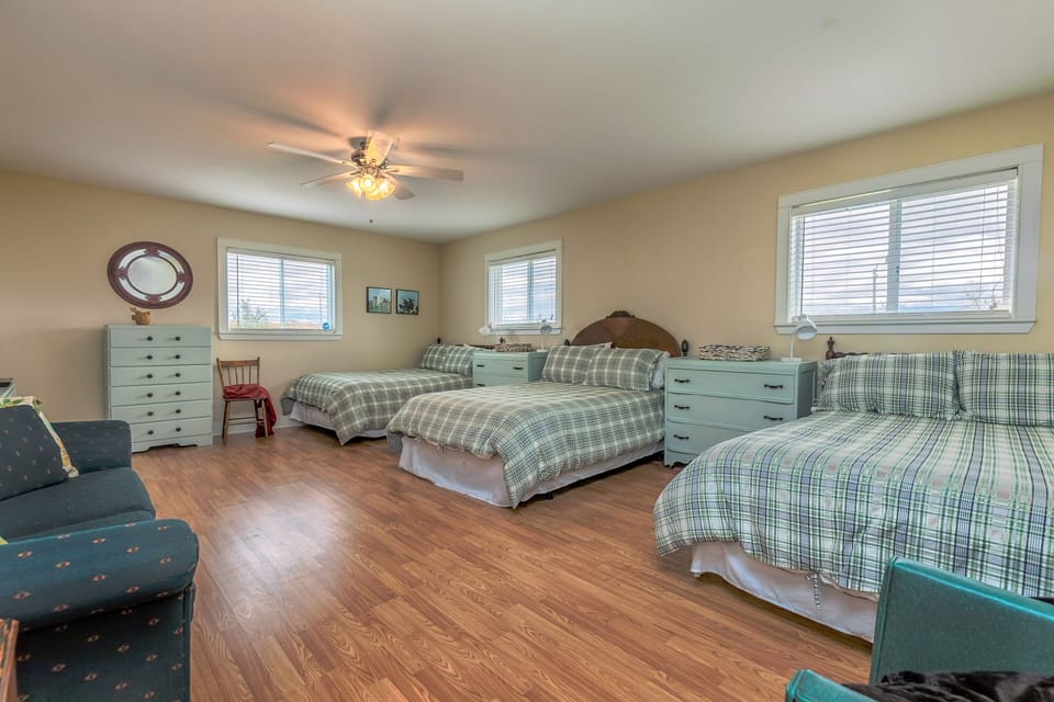 The "dorm" is a great place for kids to hang out. 3 double beds, dressers, chair