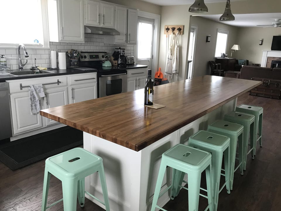 12' maple counter top  kitchen island is the star of this spacious room.