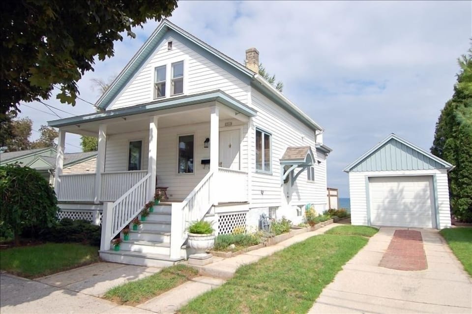 Street view with Front porch and Garage