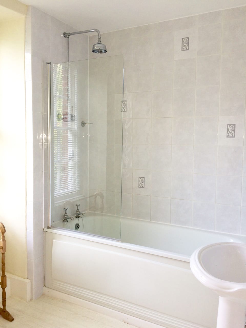 En-suite with shower over bath for room 1