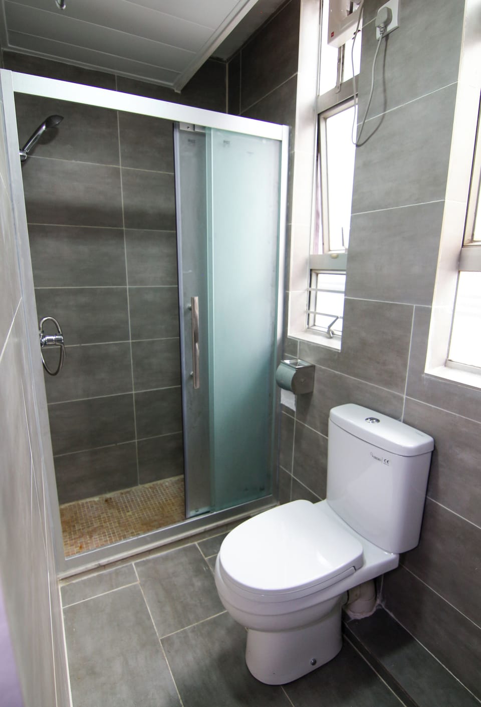 Shower, free toiletries, hair dryer, slippers