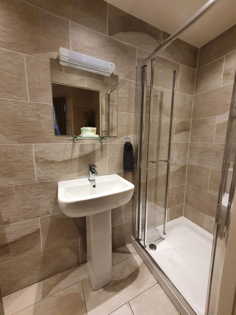 Shower, free toiletries, hair dryer, towels