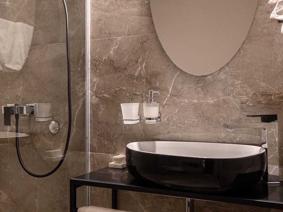 Shower, free toiletries, hair dryer, bathrobes