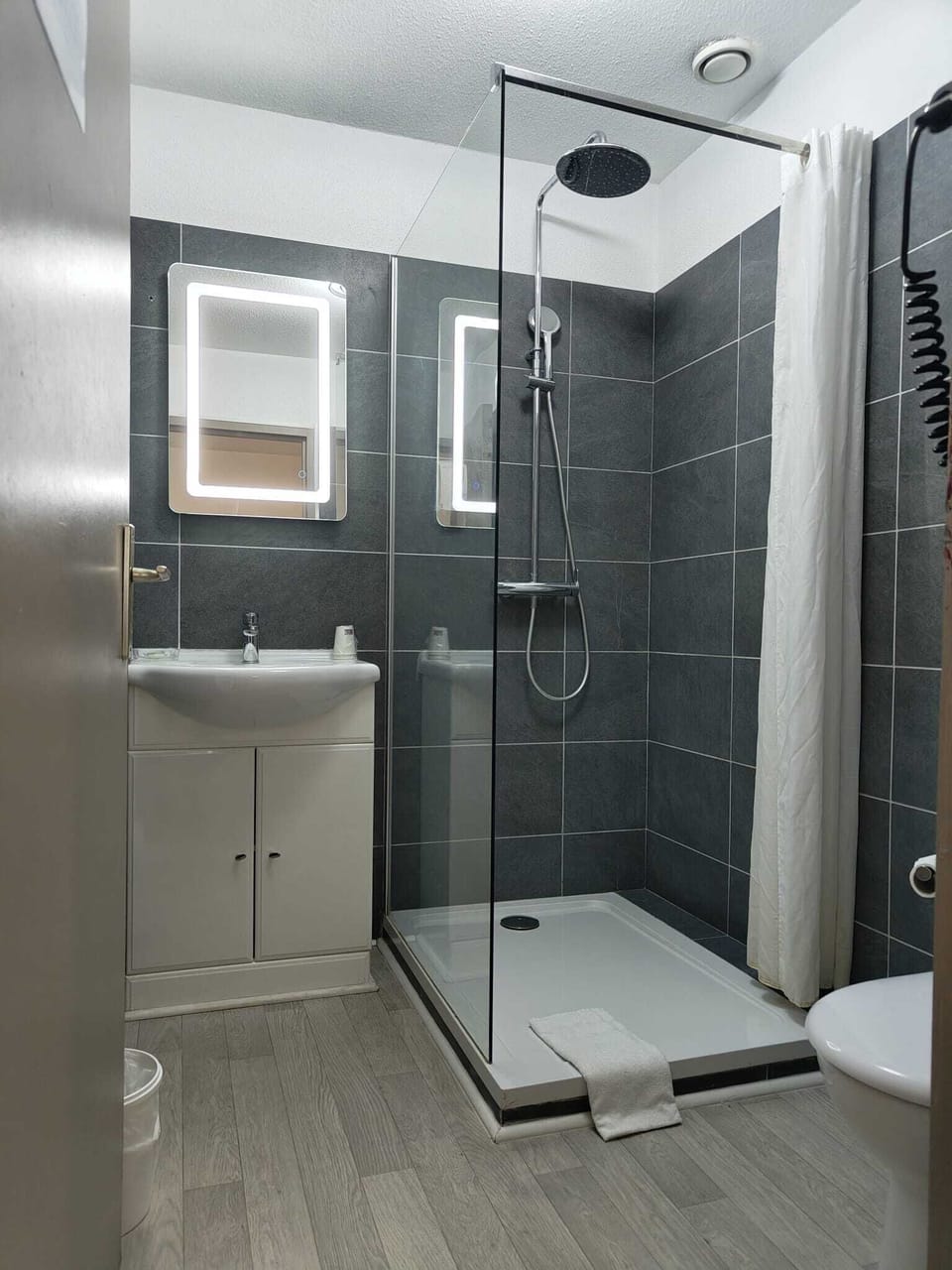 Bathroom | Shower, hair dryer, towels, soap