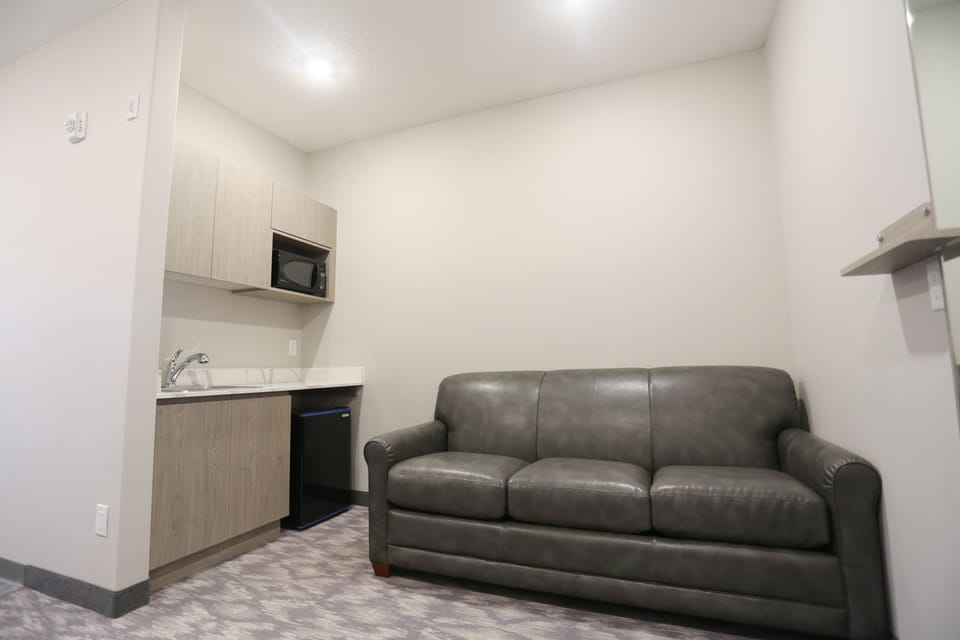 Suite, 2 Queen Beds, Non Smoking | Living area | Flat-screen TV, pay movies