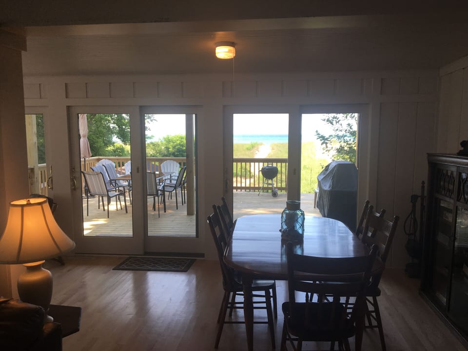 A second seating area on first floor. Porch in background