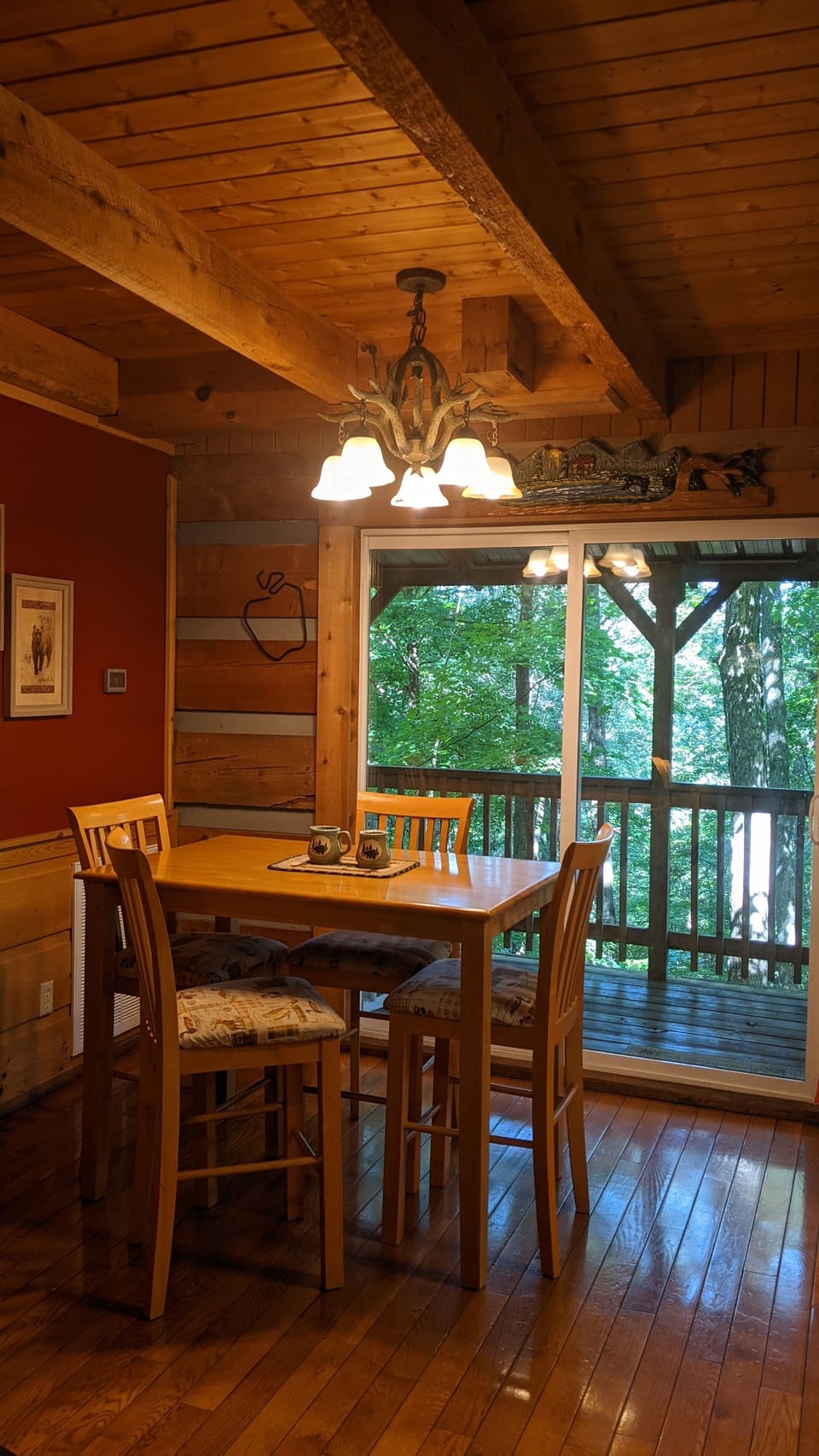 Dining table that seats 4, with a view of our back acreage. So peaceful!