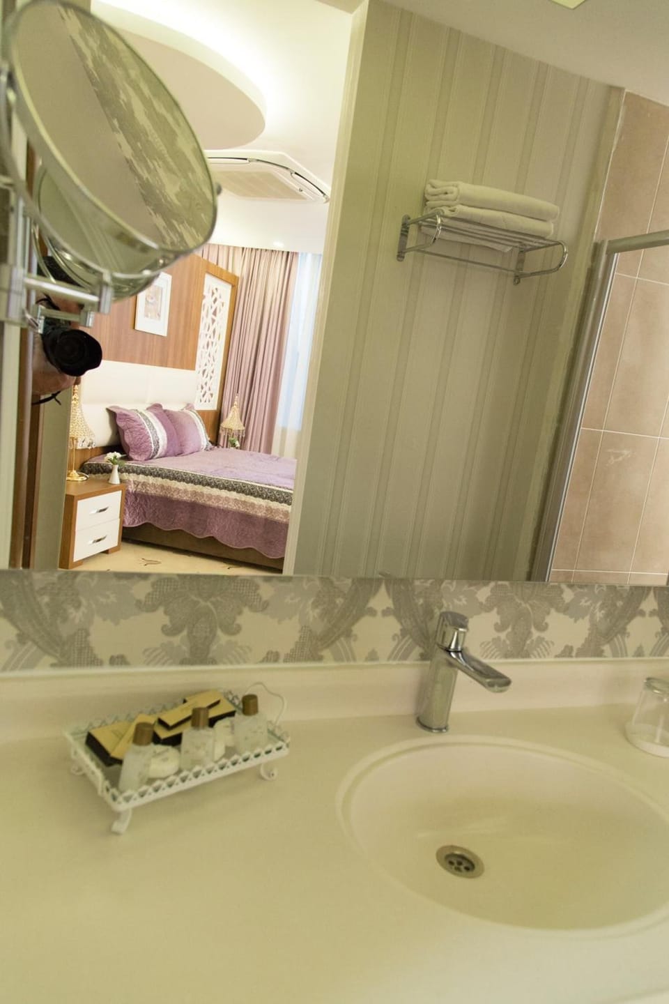 Shower, free toiletries, hair dryer, slippers