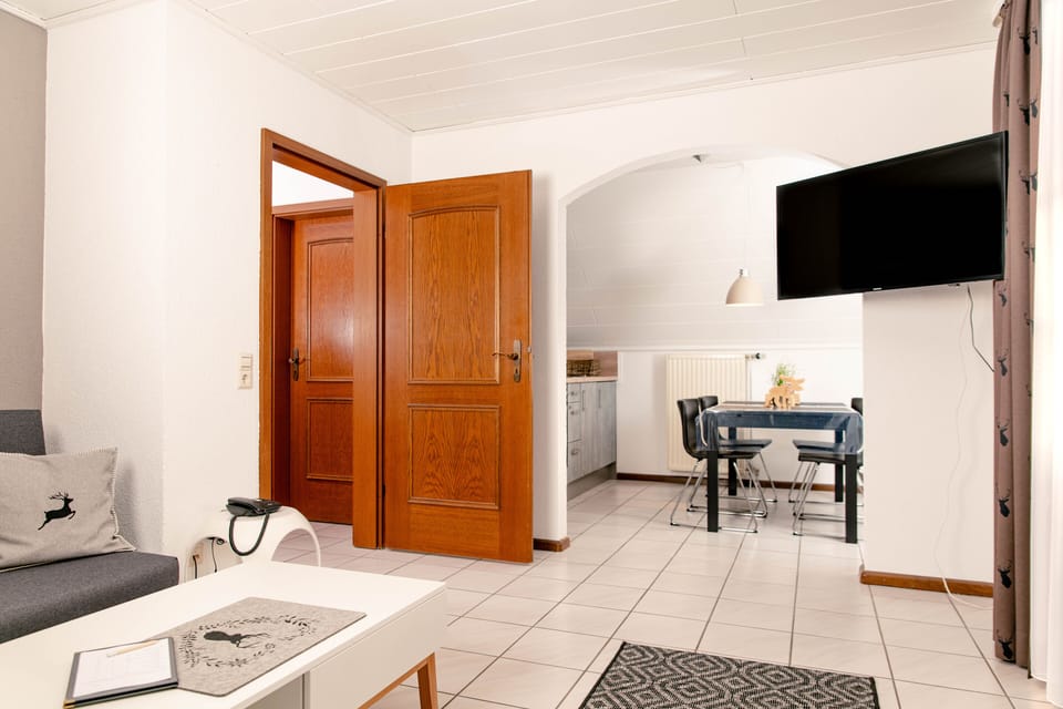 Suite | Premium bedding, desk, laptop workspace, blackout drapes