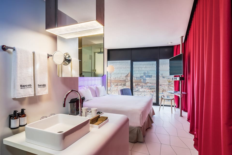 Deluxe Room, City View | Premium bedding, minibar, in-room safe, desk