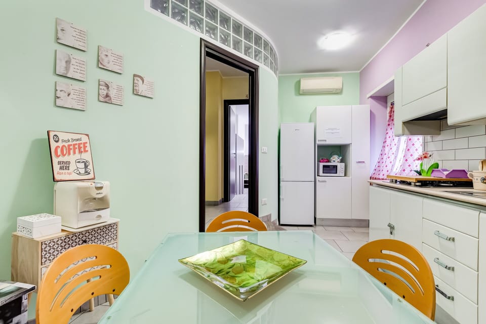 Full-size fridge, microwave, coffee/tea maker, cookware/dishes/utensils
