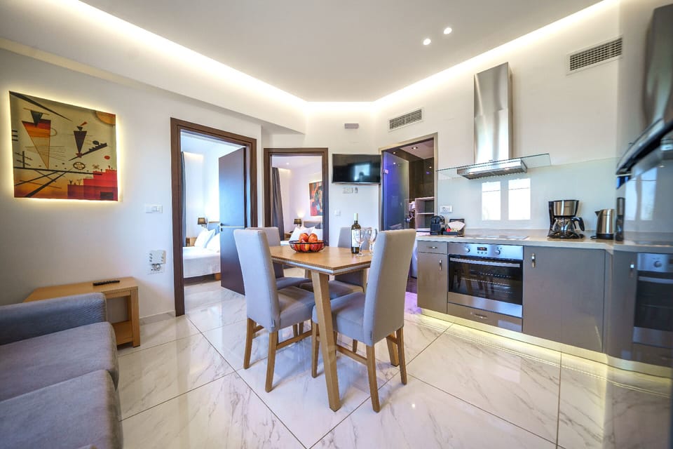 Executive One Bedroom Triple Suite | Emmanouela | Premium bedding, in-room safe, blackout drapes, soundproofing