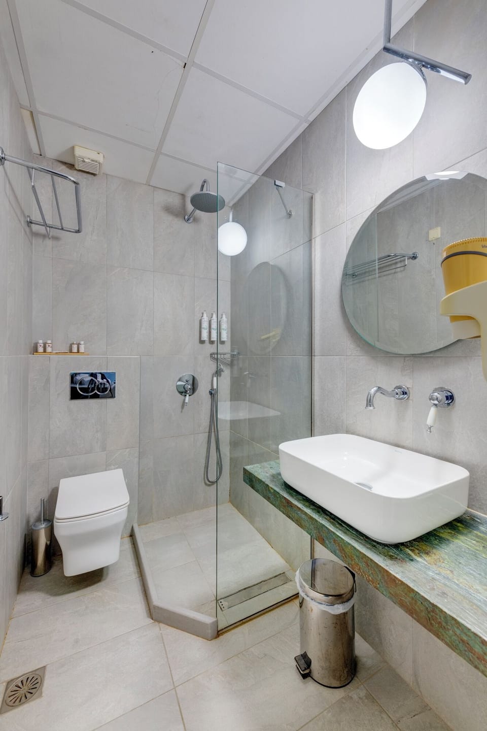 Shower, free toiletries, hair dryer, slippers