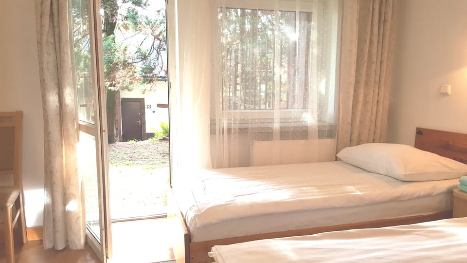 Desk, laptop workspace, cribs (free), WiFi (free)