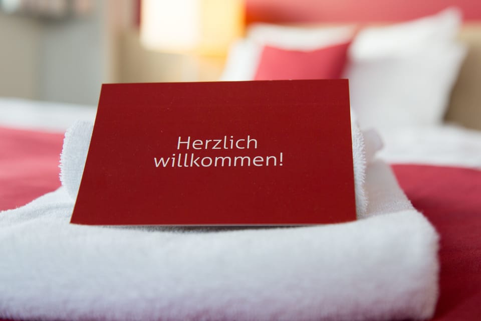 Premium bedding, desk, blackout drapes, soundproofing