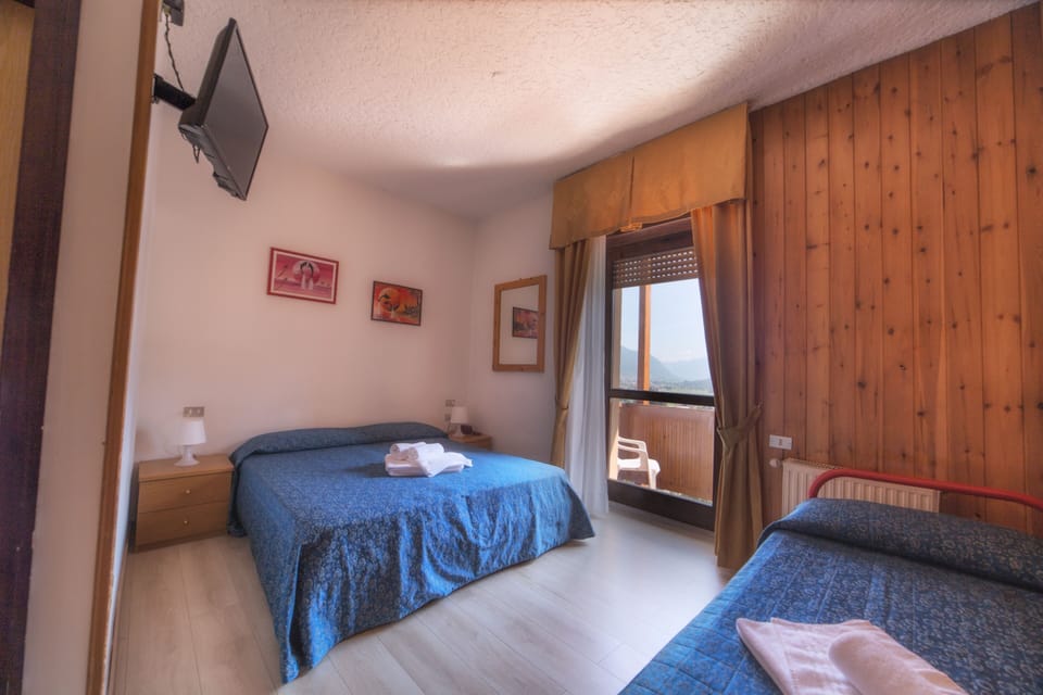 Triple Room | In-room safe, desk, blackout drapes, cribs/infant beds