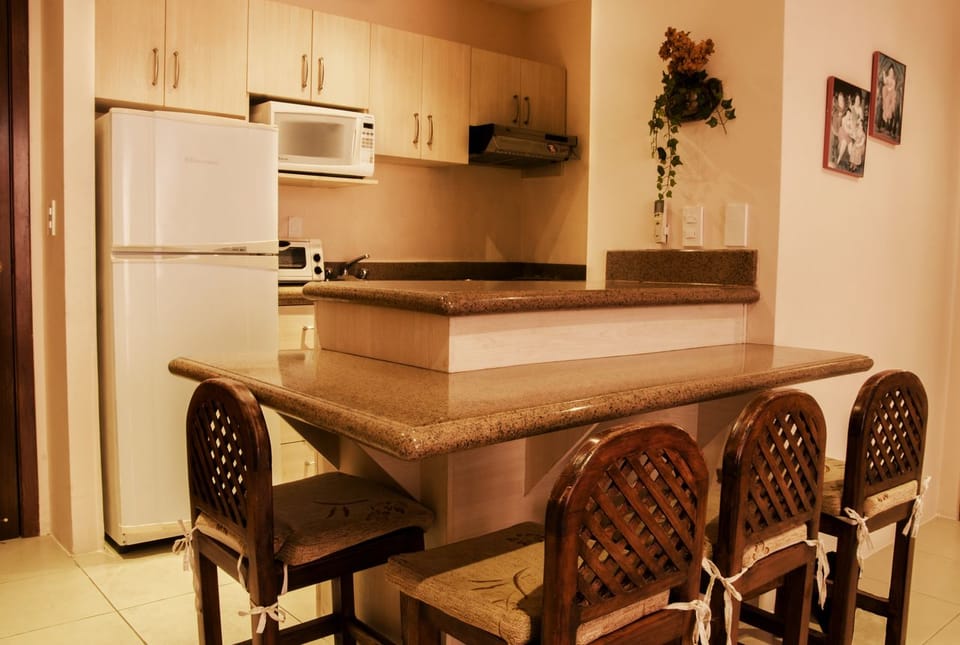 Apartment | Private kitchen | Coffee/tea maker, full-size fridge, microwave, stovetop