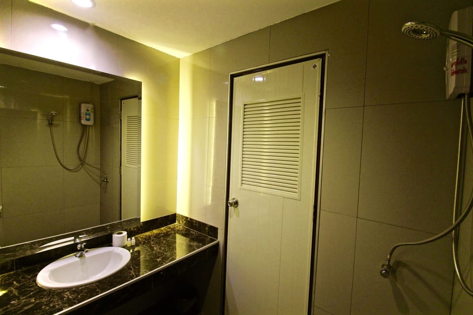 Shower, towels, soap, shampoo