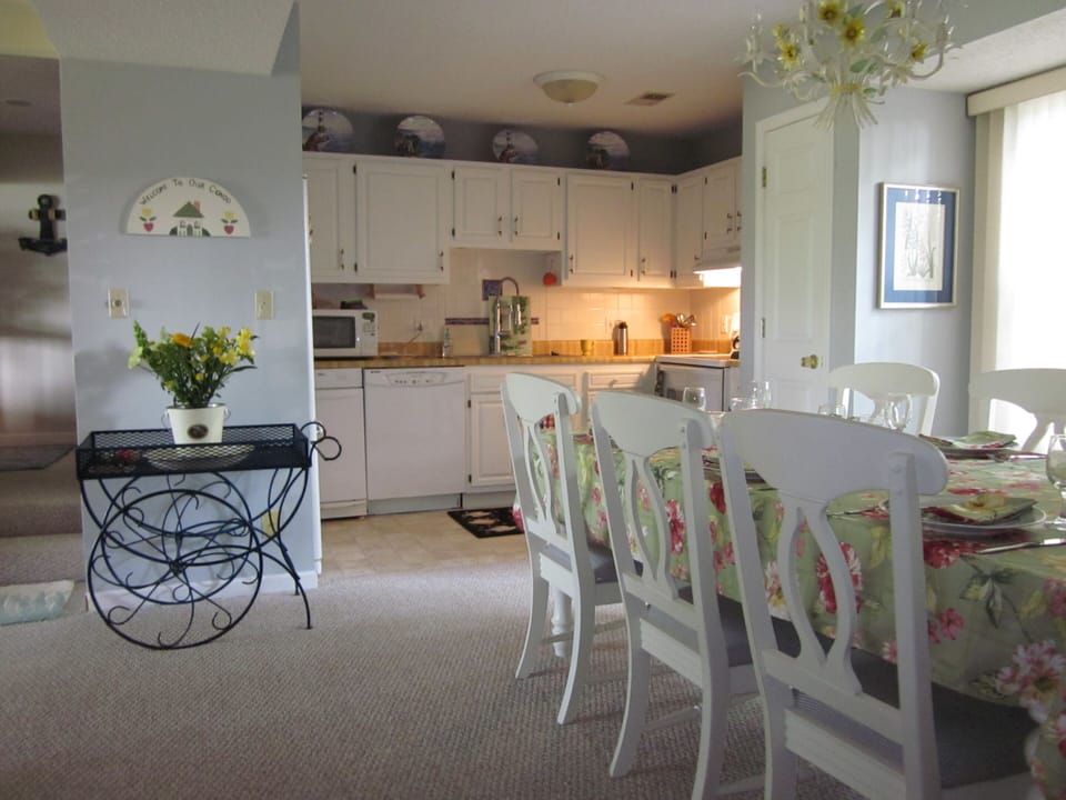 Fully stocked kitchen and dining area