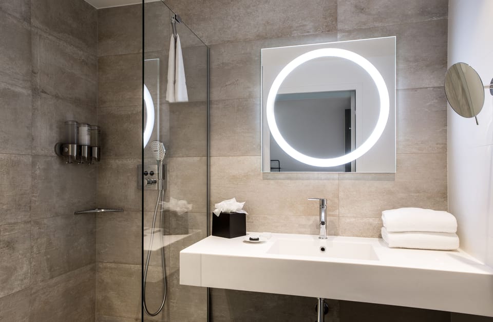 Shower, free toiletries, hair dryer, towels